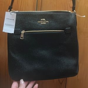 Never used black Coach Leather Rowan File Bag